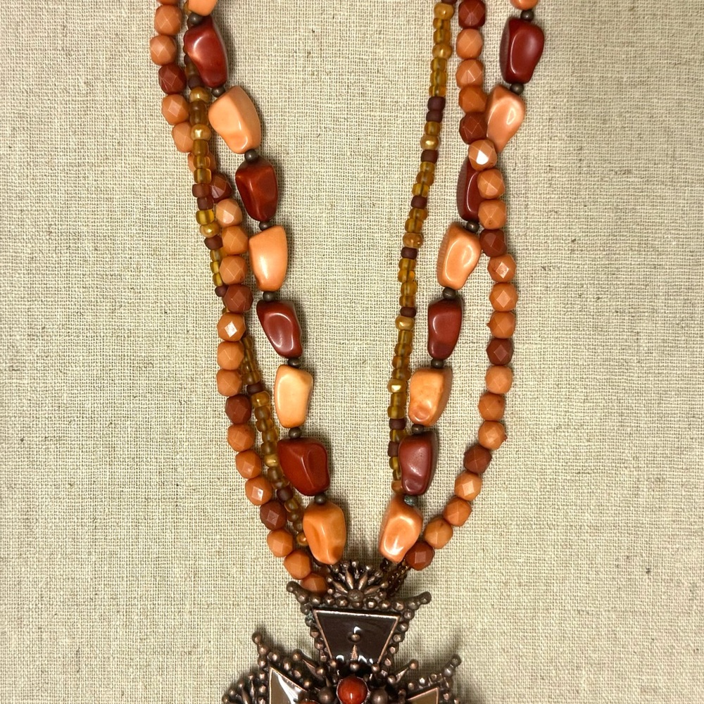 Elegant Multi-Strand Brown and Orange Cross Necklace